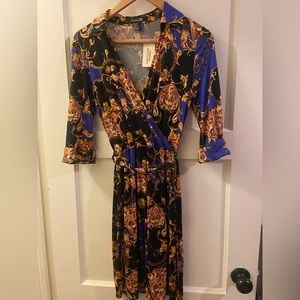 Black, Peach and Purple pattern wrap dress.